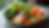 Eye-level view of a colorful plate filled with fresh vegetables and lean protein