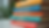 Close-up view of a stack of colorful books on self-improvement
